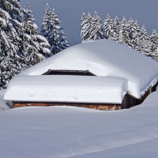 Picture Snow-covered Alpine hut - to the picture