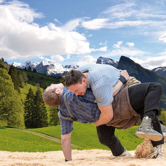 Photo Two wrestlers in battle, in the background the mountain panorama of the Diemtigtal - to the photo